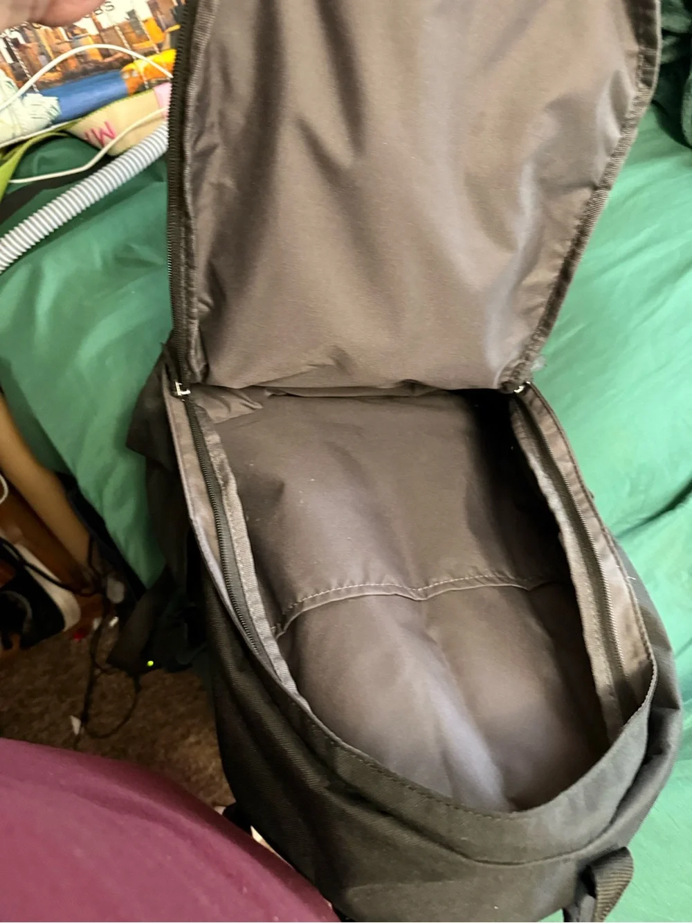 Nike Black Backpack with White Graphic and Elastic Bungee Cord
